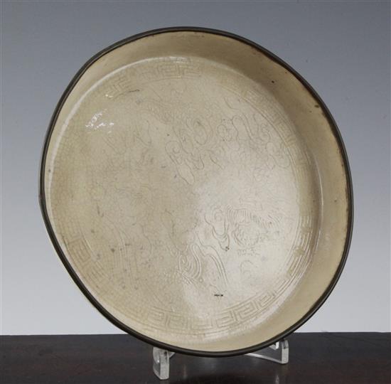 A Ding type moulded dragon dish, possibly Cizhou, Song-Jin dynasty, 20cm